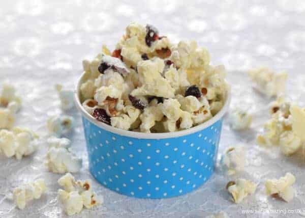 How to make Cranberry White Chocolate Popcorn - Easy popcorn recipe that is perfect for a festive family movie night - Eats Amazing UK