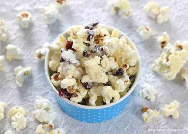 How to make Cranberry White Chocolate Popcorn - Easy treat recipe that is perfect for a family movie night - Eats Amazing UK