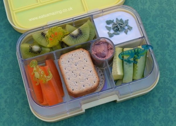 Easy bento lunch ideas for kids - simple and healthy dinosaur bento lunch in the Yumbox UK bento box - with cupcake picks and sprinkles to decorate - Eats Amazing UK