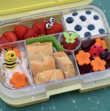 Garden themed bento box idea with cute strawberry caterpillar from Eats Amazing UK - healthy fun food for kids