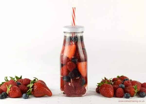 Summer Berry Fruit Infused Water for Kids - such a fun way to convince kids to drink enough water and stay hydrated this summer - recipe from Eats Amazing UK