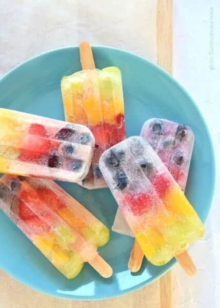Gorgeous easy rainbow popsicles - these simple homemade fruit ice lollies are fun to make and perfect for kids - Eats Amazing UK