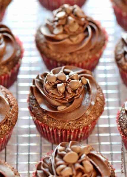 Gorgeous easy chocolate cupcakes recipe with chocolate buttercream icing and a chocolate melting middle - Eats Amazing UK