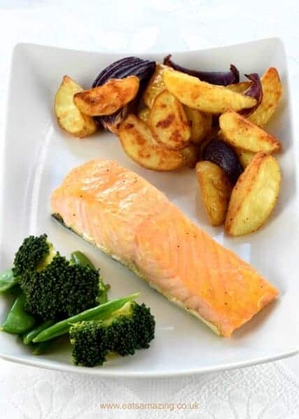 Really quick and easy oven baked honey mustard salmon fillets recipe with homemade potato wedges - great mid-week family meal idea from Eats Amazing UK