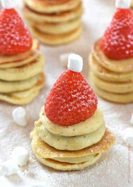 Cute Santa Hat Mini Pancake Stackers recipe - a fun and healthy Christmas breakfast idea for kids from Eats Amazing UK