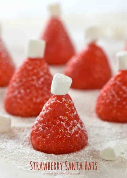 Super Easy Christmas Snack Idea - these simple strawberry Santa hats are perfect for party food or a North Pole Breakfast - Eats Amazing UK