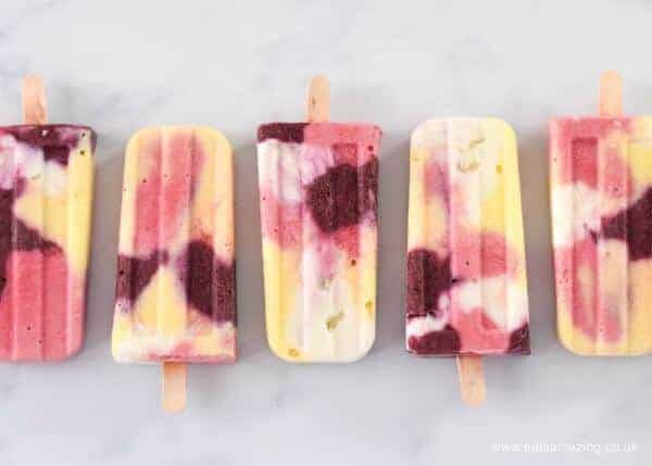 How to Make Healthy Unicorn Rainbow Fruit Popsicles - These beautiful all natural popsicles will be a hit for kids snacks this summer - Eats Amazing