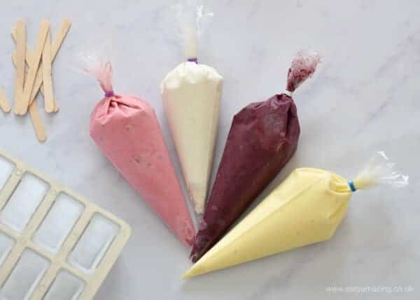 How to make Unicorn Rainbow Fruit Popsicles - These beautiful healthy popsicles will be a hit for kids snacks this summer - Eats Amazing