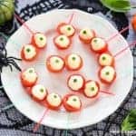 Spooky Eyeball Caprese Bites Recipe - fun easy healthy Halloween food - perfect for Halloween party food snacks and kids lunchboxes - Eats Amazing UK