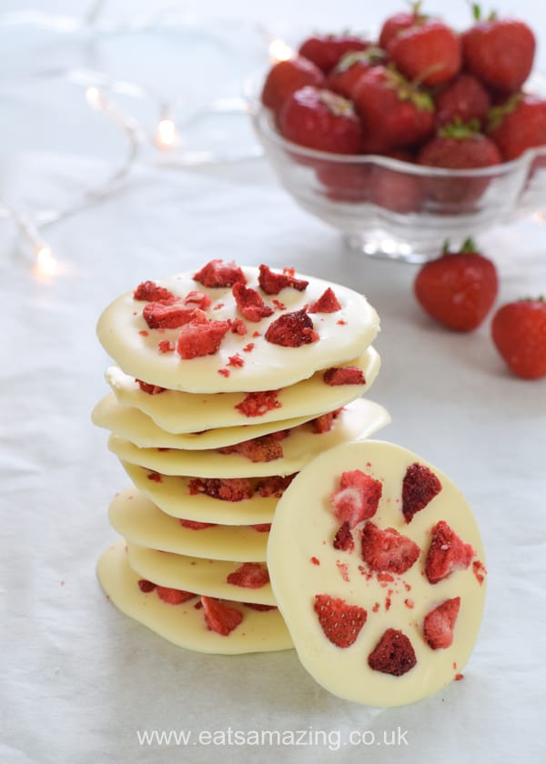 Gorgeous strawberries and cream white chocolate mendiants - these giant chocolate buttons are great quick and easy gifts for kids to make