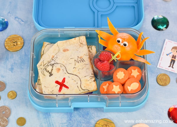 How to make a fun and healthy Pirate themed lunch box for kids with edible treasure map quesadillas orange octopus and carrot coins - packed in the Yumbox bento box