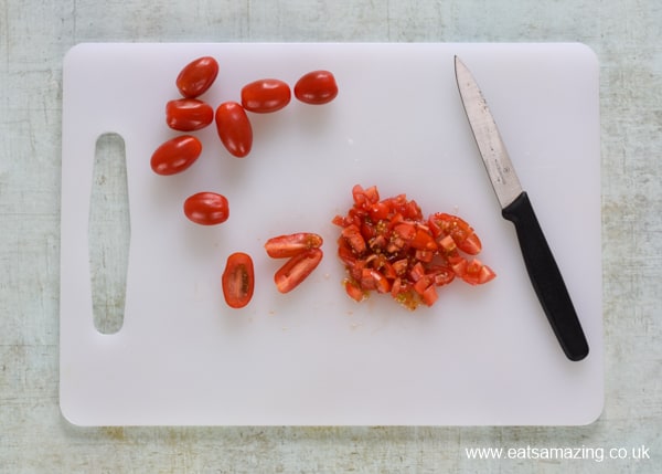 How to make easy homemade kid-friendly guacamole - step 1 finely chop cherry tomatoes