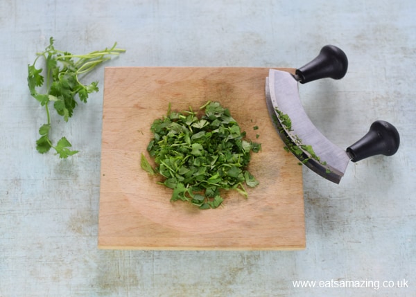 How to make easy homemade kid-friendly guacamole - step 2 finely chop fresh coriander leaves