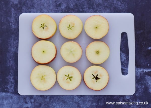 Fun and healthy Halloween food for kids - monster apple donuts recipe - step 1 slice apples into 1cm thick rounds