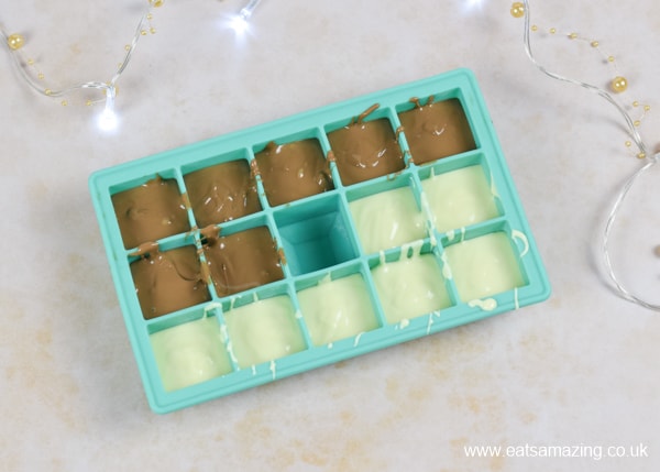 How to make hot chocolate stirrers - step 1 melt the chocolate and pour into ice cube mould
