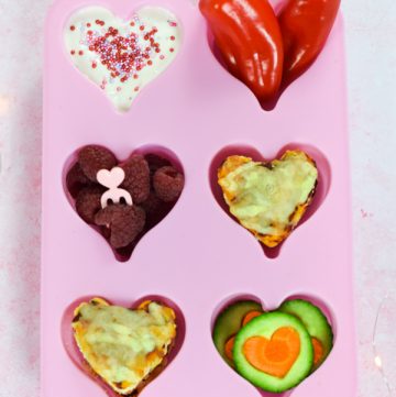 Fun and easy Valentines themed muffin tin meal for kids with mini heart pizza bites recipe - great for toddlers and baby led weaning