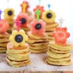 Cute mini pancake stacks with fruit flowers - fun special breakfast idea for kids