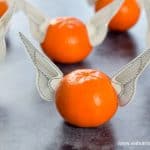 Orange snitches - fun and healthy Harry Potter themed party food for kids with free snitch wings printable