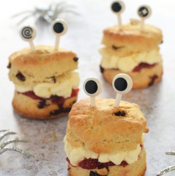 Three monster scones with jam and whipped cream - fun Halloween recipe