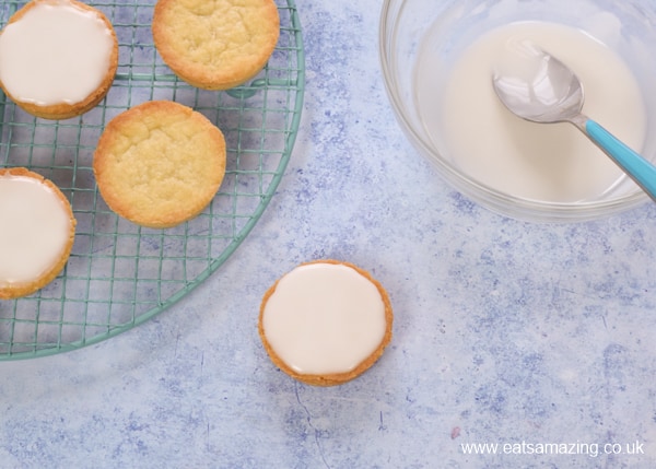 How to make shortbread snowman cookies - spread a circle of icing over the cookie