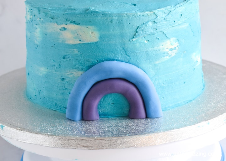 How to make a fondant rainbow cake decoration - step 7 continue with next colou