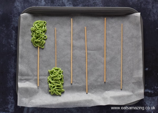 How to make easy chocolate monster pops for Halloween - step 2 draw squiggly patterns with chocolate melts