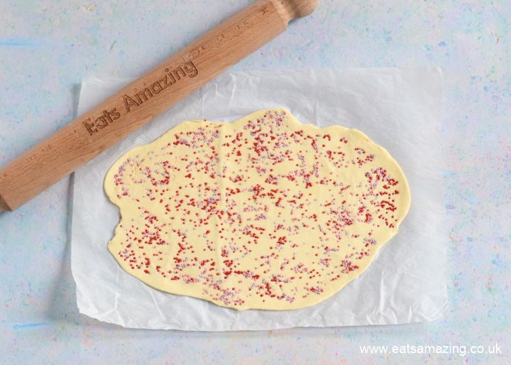 How to make easy Sprinkle Pastry Hearts - Step 3 use rolling pin to embed the sprinkles in the pastry