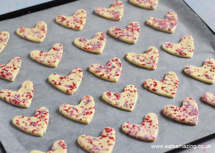 How to make easy Sprinkle Pastry Hearts - Step 5 place on a lined baking tray and bake