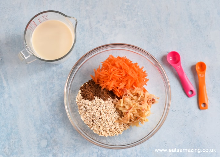 Quick and easy Carrot Cake Porridge step 1 - mix grated carrot apple and oats in a bowl with the spices