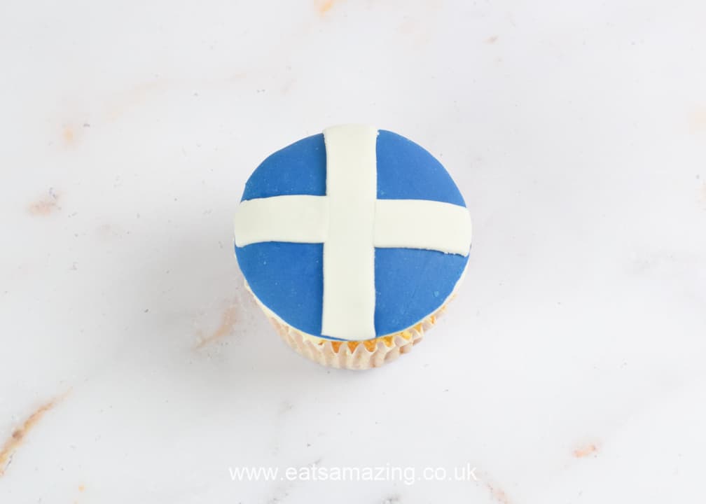 How to make and decorate Union Jack Cupcakes - step 2 add a white cross