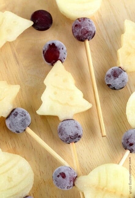 Easy Christmas Frozen Melon and Grape Pops - healthy snack idea for kids - change up the shapes to suit different seasons
