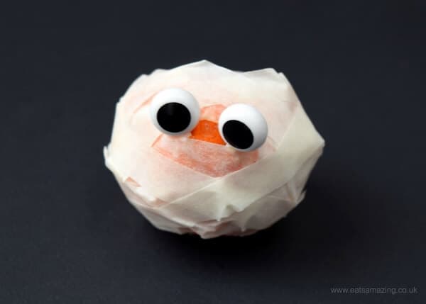 Mummified mandarin orange - healthy and fun Halloween food idea for kids from Eats Amazing UK - great for lunch boxes