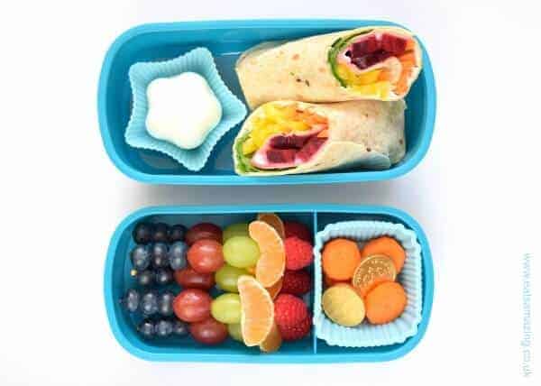 Step by step simple and healthy rainbow bento lunch idea for kids with rainbow tortilla wrap recipe and rainbow fruit skewers from Eats Amazing UK