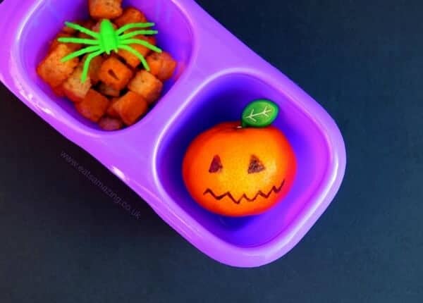 Turn clementines into pumpkins with a sharpie and little leaf pick - fun Halloween snack idea for kids from Eats Amazing UK